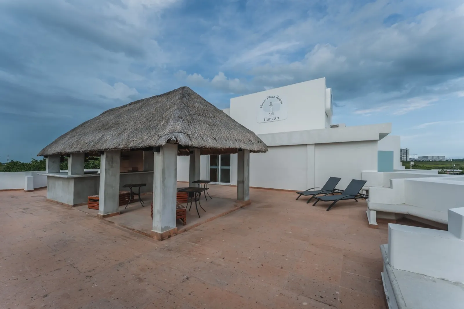 Rooftop terrace with palapa at Hotel Plaza Kokai